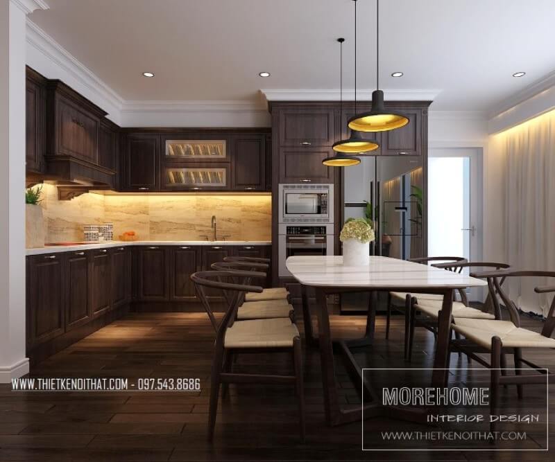 Tủ bếp chung cư ấn tượng với tone màu trầm mang lại từ gỗ óc chó cao cấp, ngoài ra còn khéo léo lồng ghép tcác thiết bị gia dụng nhà bếp hiện đại giúp cho những người nội trợ dễ dàng chế biết mang lại cho người yêu thương của mình những món ăn ngon miệng Tủ bếp biệt thự