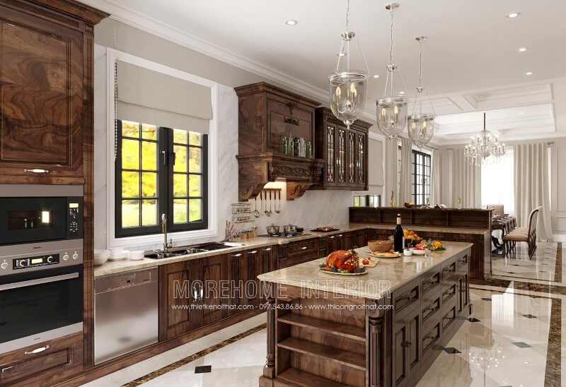 Mẫu tủ bếp tân cổ điển được làm từ chất liệu gỗ óc chó đầy mới lạ, sang trọng, mang tính thẩm mĩ cao nhờ những đường vân gỗ tự nhiên uốn lượn bắt mắt Tủ bếp biệt thự