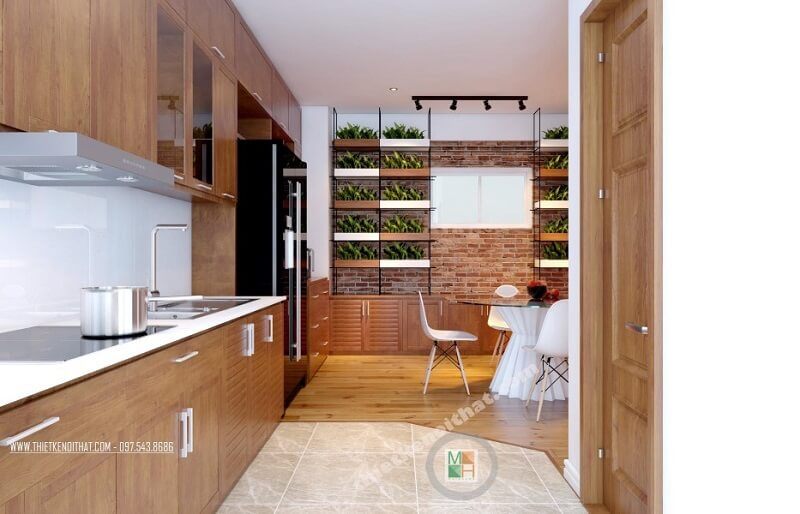 Thiết kế phòng bếp chung cư hiện đại với hệ tủ bếp gỗ tự nhiên cao cấp mang đến không gian nấu ăn lí tưởng cho các chi em nội trợ.